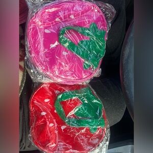 New in bags, 2, strawberry purses, one red one pink